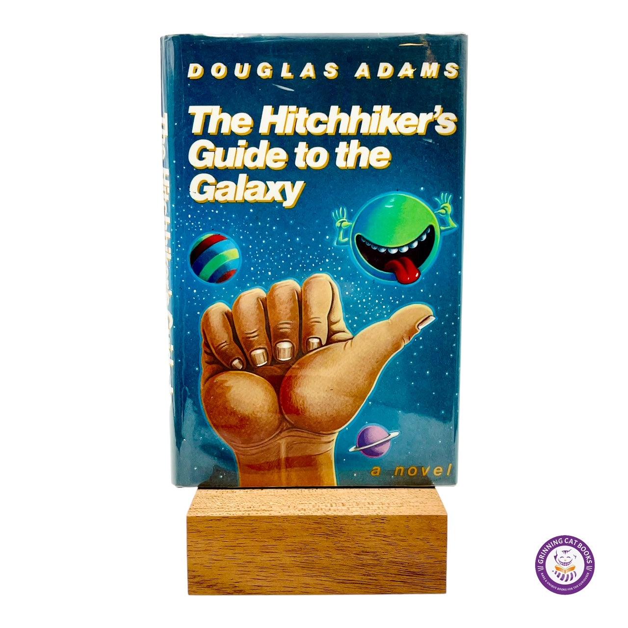 The Hitchhiker's Guide to the Galaxy Trilogy - Grinning Cat Books - books - SCIENCE FICTION