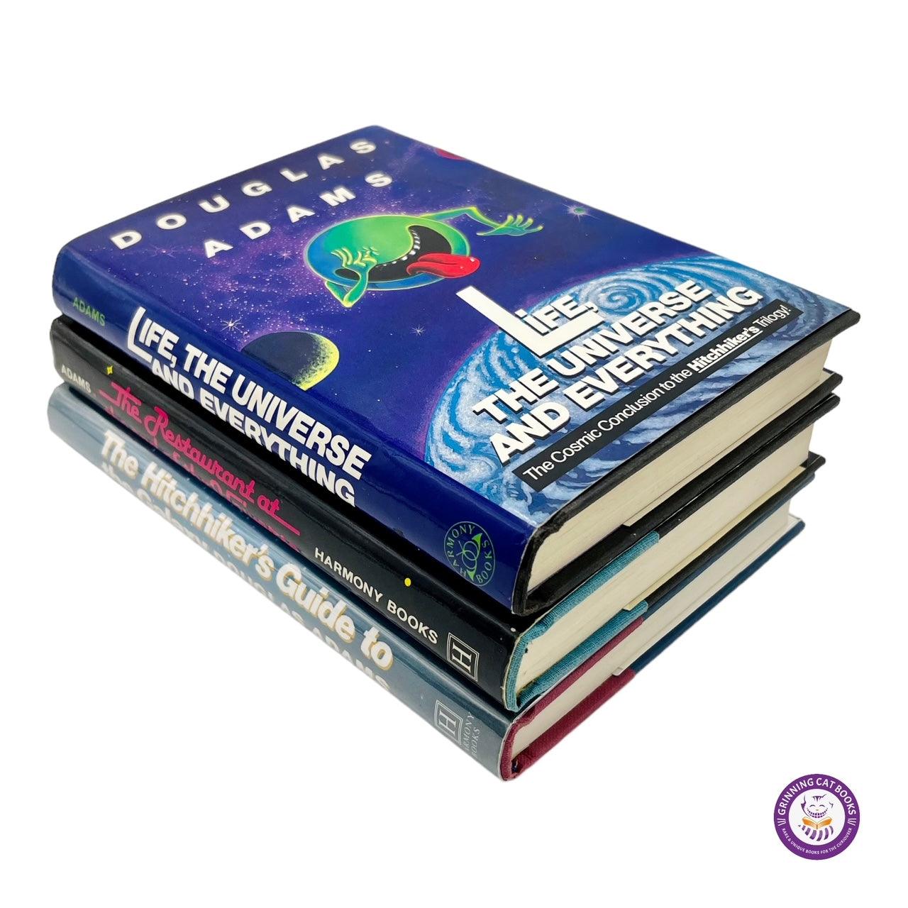 The Hitchhiker's Guide to the Galaxy Trilogy - Grinning Cat Books - books - SCIENCE FICTION